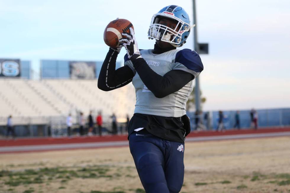 Centennial's running back Jordan Smith makes a catch during a team practice at Centennial High ...