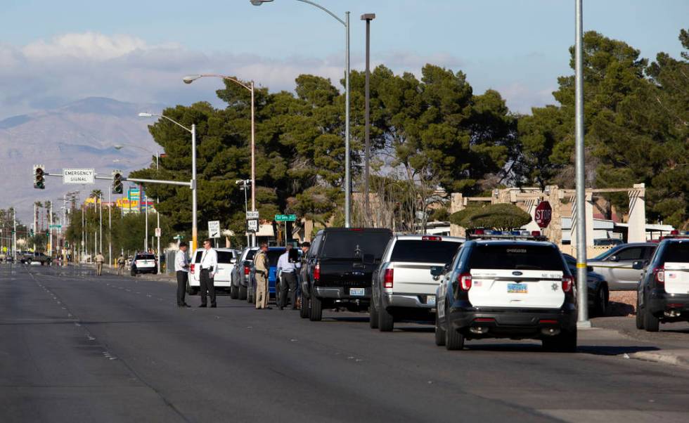 Las Vegas police respond to a barricade situation with an armed male near the 100 block of Bel ...