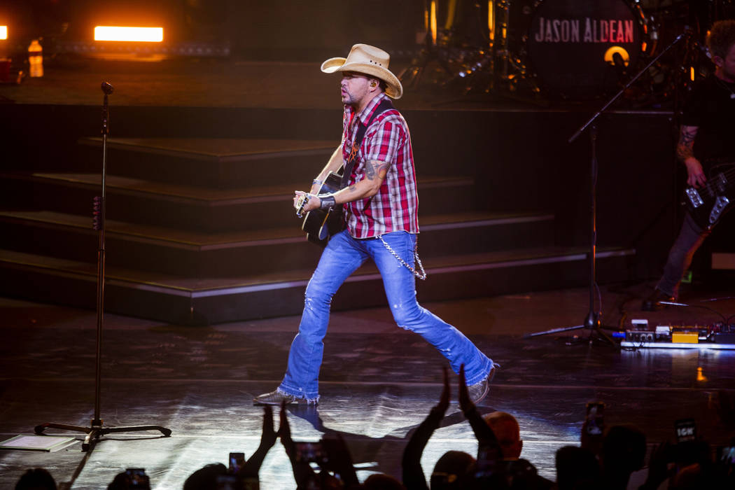 Jason Aldean performs at the Park MGM's Park Theater in Las Vegas on Friday, Dec. 6, 2019. (Eli ...