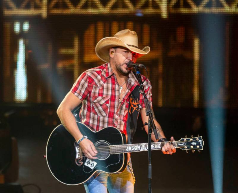 Jason Aldean performs at the Park MGM's Park Theater in Las Vegas on Friday, Dec. 6, 2019. (Eli ...