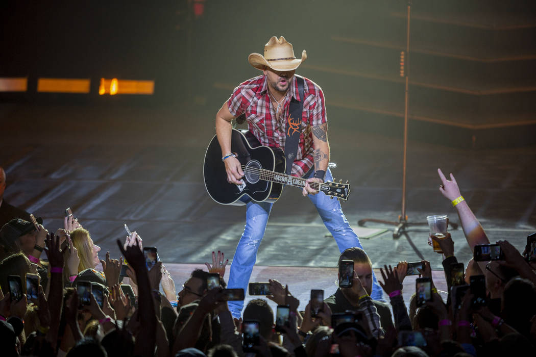 Jason Aldean performs at the Park MGM's Park Theater in Las Vegas on Friday, Dec. 6, 2019. (Eli ...