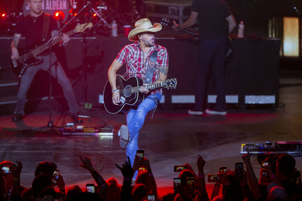 Jason Aldean performs at the Park MGM's Park Theater in Las Vegas on Friday, Dec. 6, 2019. (Eli ...