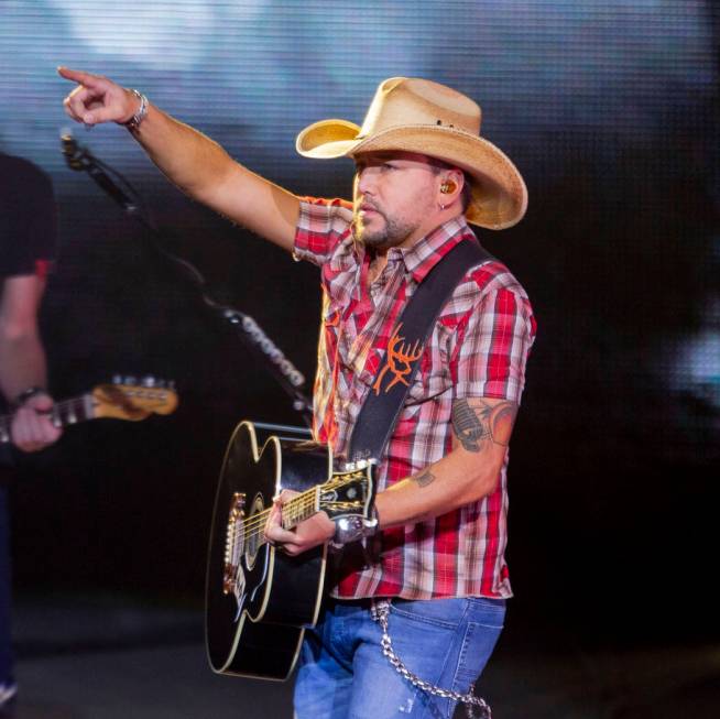 Jason Aldean performs at the Park MGM's Park Theater in Las Vegas on Friday, Dec. 6, 2019. (Eli ...