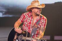 Jason Aldean performs at the Park MGM's Park Theater in Las Vegas on Friday, Dec. 6, 2019. (Eli ...