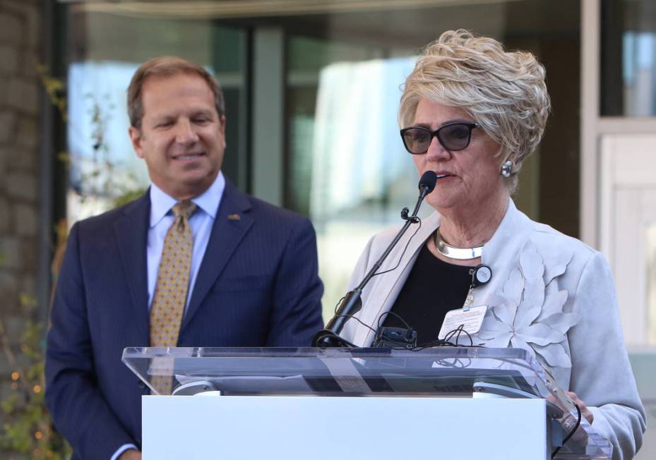 Todd Sklamberg, left, CEO, Sunrise Hospital Medical Center, listens as Sandy Miller, chairwoman ...