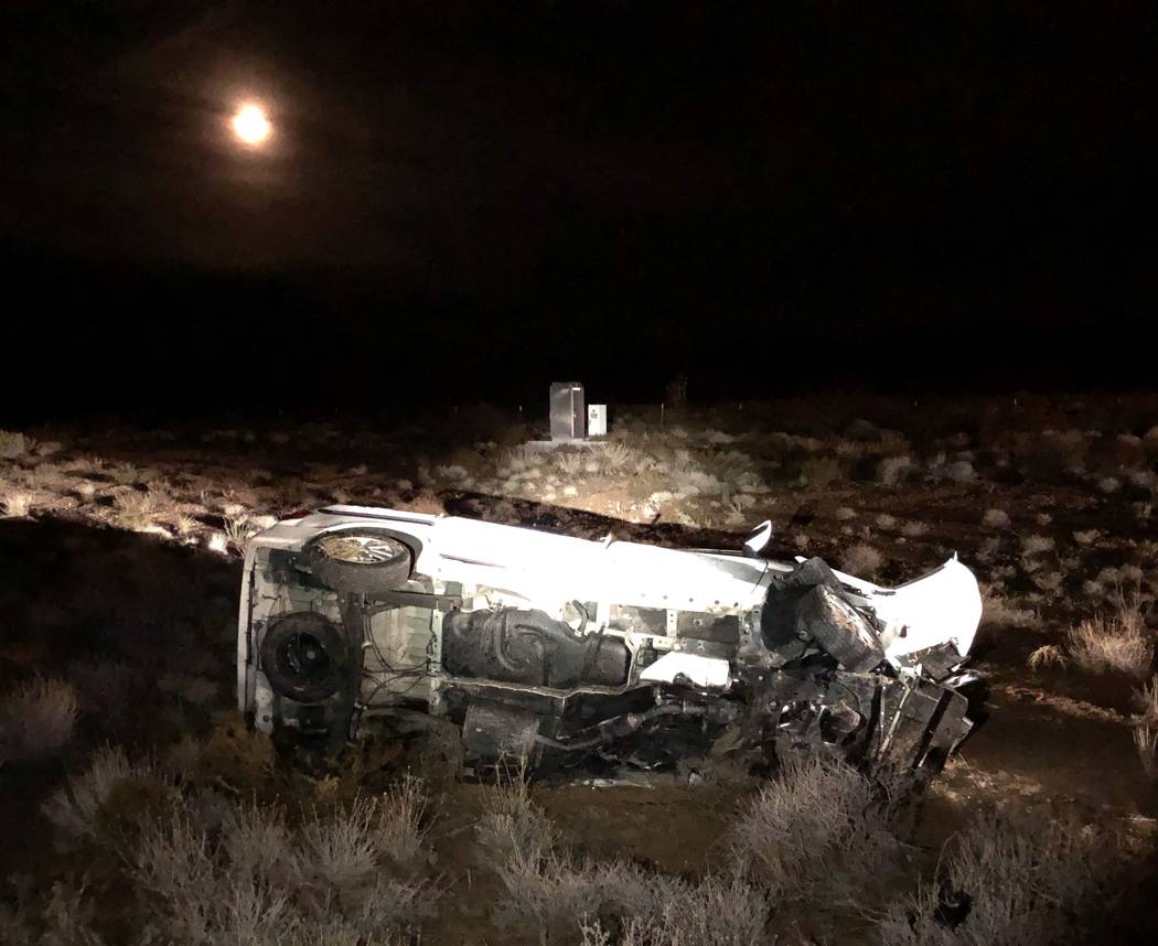The remains of a vehicle involved in a wrong-way crash that left two people dead on Thursday, D ...