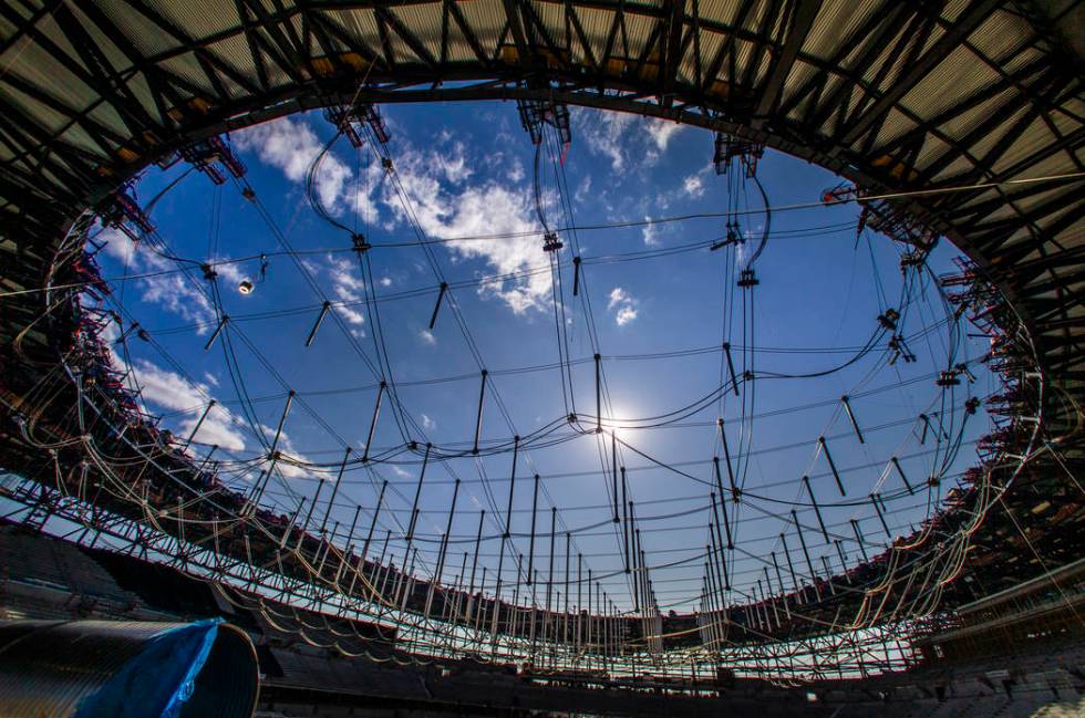 Steel cables are in place to raise the roof during a tour of the Raiders Allegiant Stadium cons ...