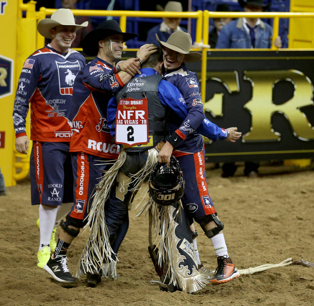 Bull rider Stetson Wright of Milford, Utah, celebrates his 92.5 ride on Monte Walsh which won t ...