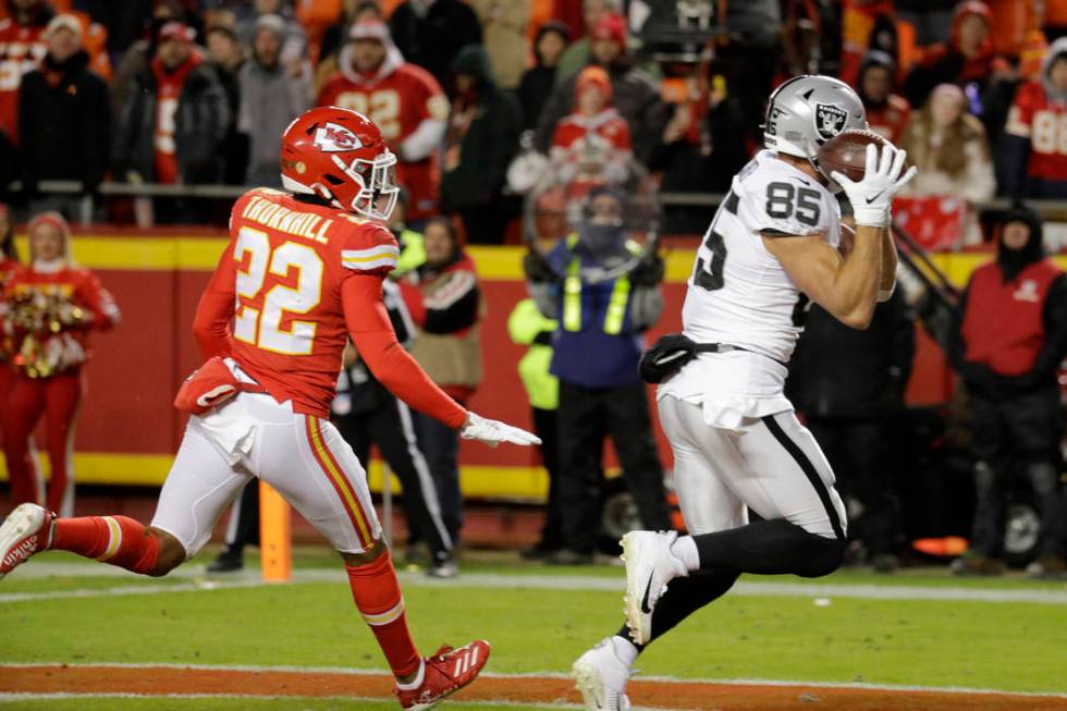 Oakland Raiders tight end Derek Carrier (85) makes a touchdown catch in front of Kansas City Ch ...