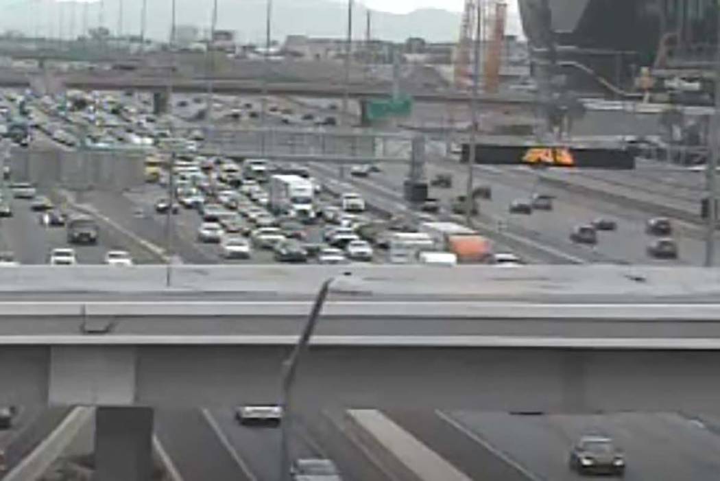 Two lanes are blocked Saturday morning on Interstate 15 northbound at Tropicana Avenue in Las V ...