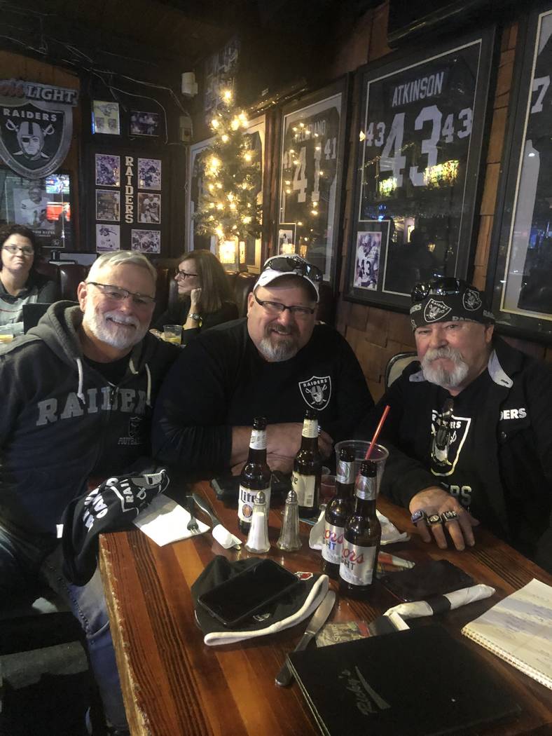 Brothers and lifetime Raiders fans (L-R) Terry, James and Jerry Cunningham gather at Ricky’s ...
