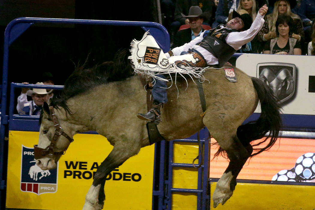 Kaycee Feild of Genola, Utah rides Colorado Bulldog to a score of 87 in the Bareback Riding com ...