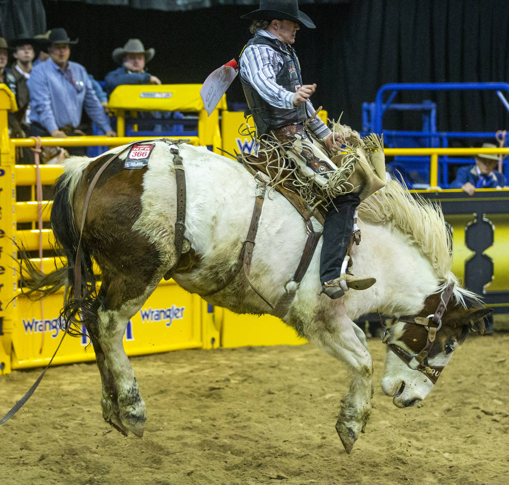 Chase Brooks of Deer Lodge, Mont., rides Lunatic Party to first place with a score of 90.0 in S ...