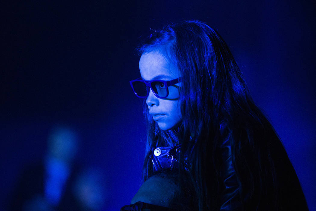 Alana Alcazar, 10, watches Flying Lotus's 3D performance from the shoulders of her dad, Alex Be ...