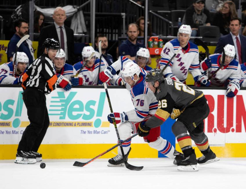 New York Rangers defenseman Brady Skjei (76) and Vegas Golden Knights center Paul Stastny (26) ...