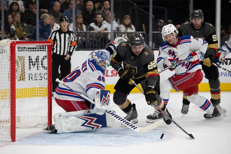 Vegas Golden Knights left wing William Carrier (28) makes an unsuccessful shot on goal as New Y ...