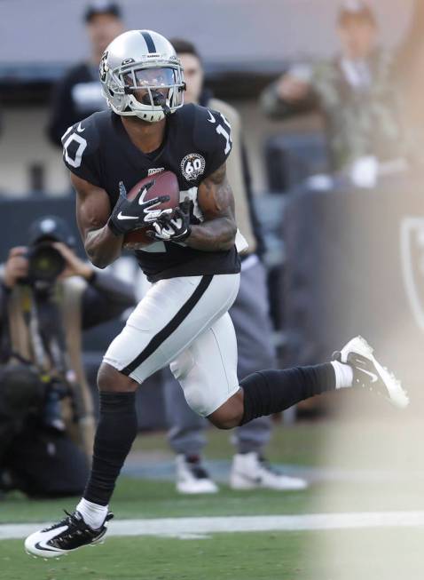 Oakland Raiders wide receiver Rico Gafford (10) catches a touchdown pass against the Tennessee ...