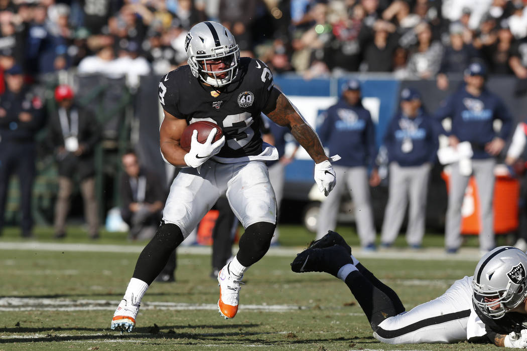 Oakland Raiders running back DeAndre Washington (33) runs against the Tennessee Titans during t ...