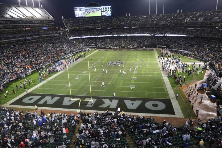 An overview of the Oakland-Alameda County Coliseum before the start of an NFL game between the ...