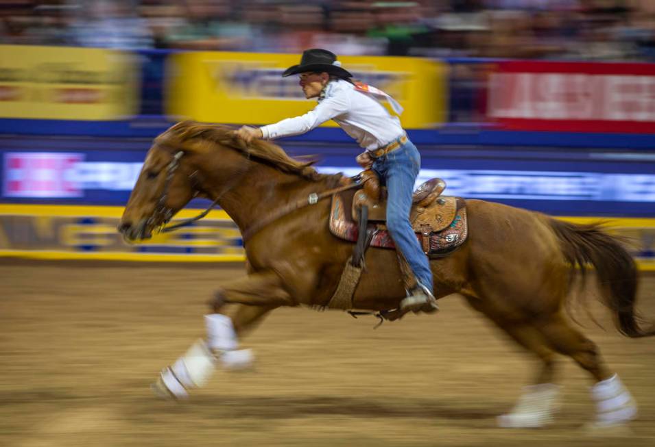 Dona Kay Rule of Minco, Okla., heads home in Barrel Racing during the third go round of the Wra ...