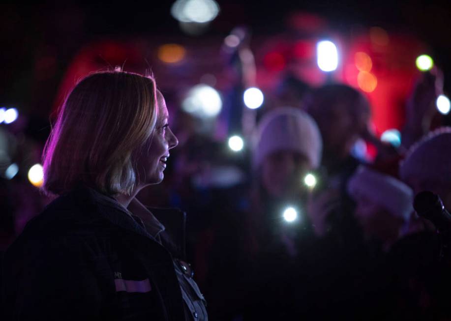 MedicWest paramedic Heather Raasveld, who organized the event, leads the crowd in moving their ...