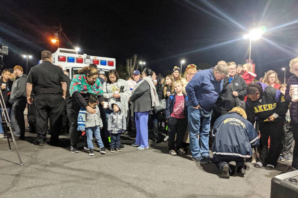 People gather Monday, Dec. 9, 2019, outside of the Children’s Hospital at University Med ...