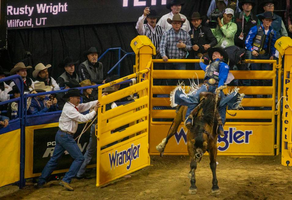 Rusty Wright of Milford, Utah, stays on top of Miss Nancy for a score of 89.5 points to take fi ...