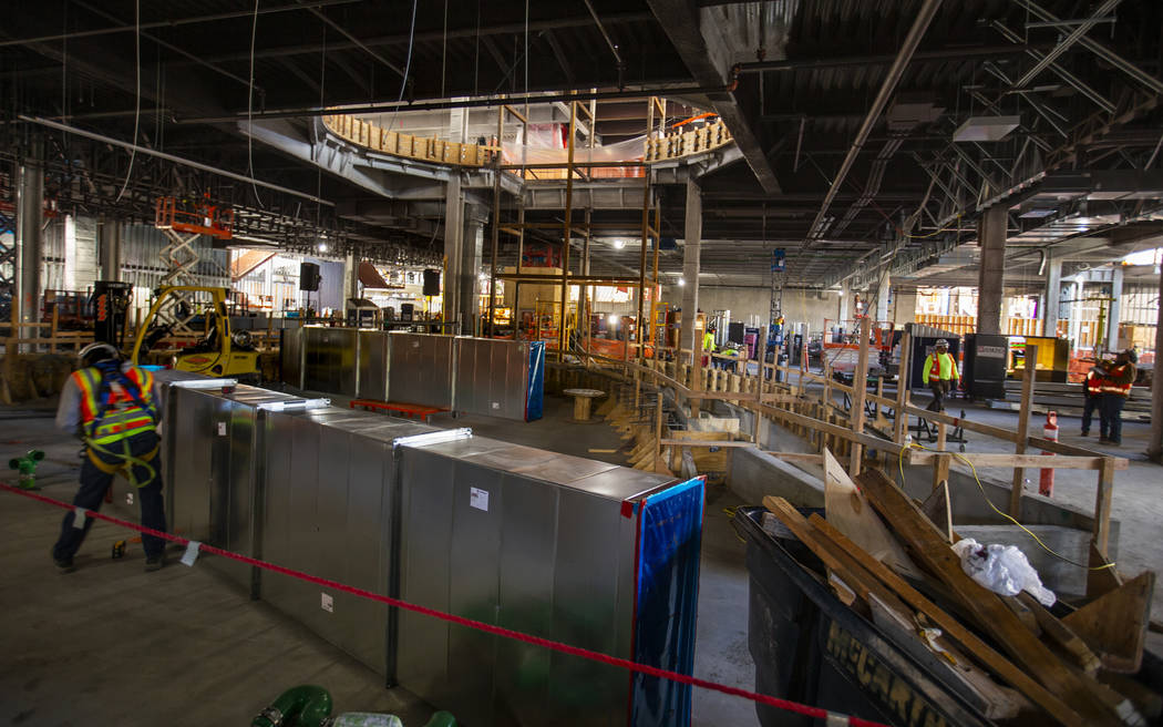 Workers continue to develop the main floor during a construction tour of the Circa on Monday, D ...