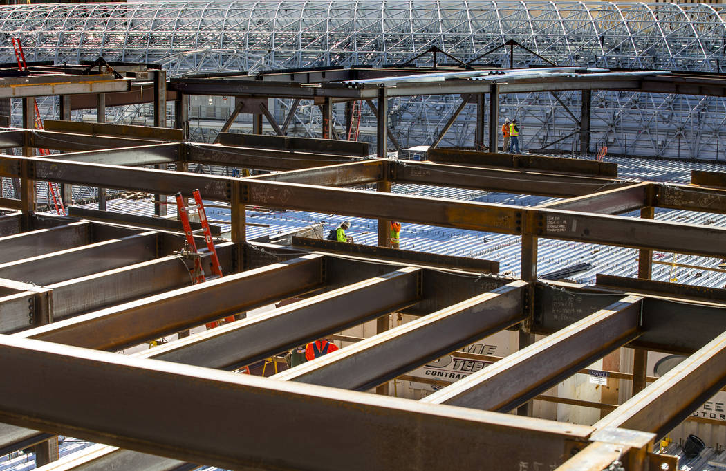 Steel continues to be erected in the pool area during a construction tour of the Circa on Monda ...