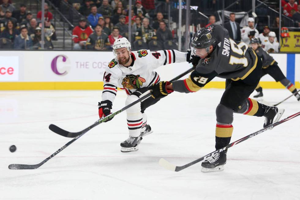 Chicago Blackhawks defenseman Calvin de Haan (44) defends a shot by Vegas Golden Knights right ...