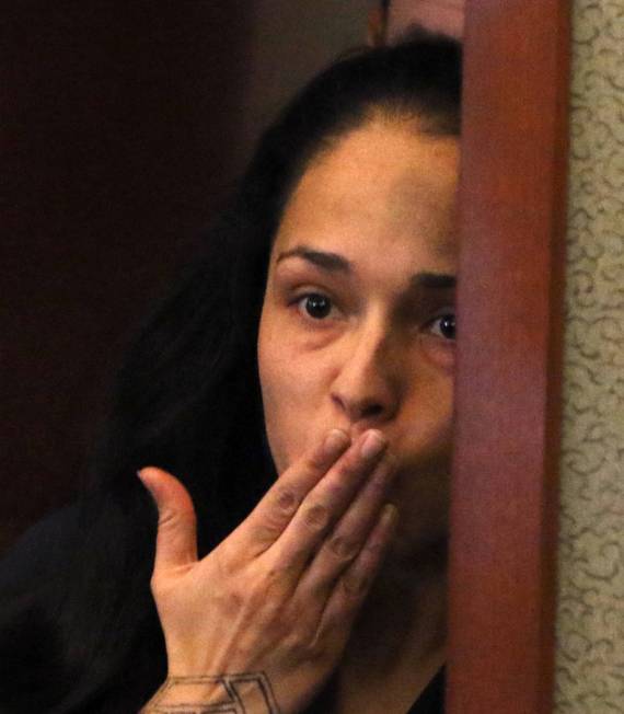 Grissel Gonzaga, who's accused of killing her ex-girlfriend's new boyfriend, blows a kiss to he ...