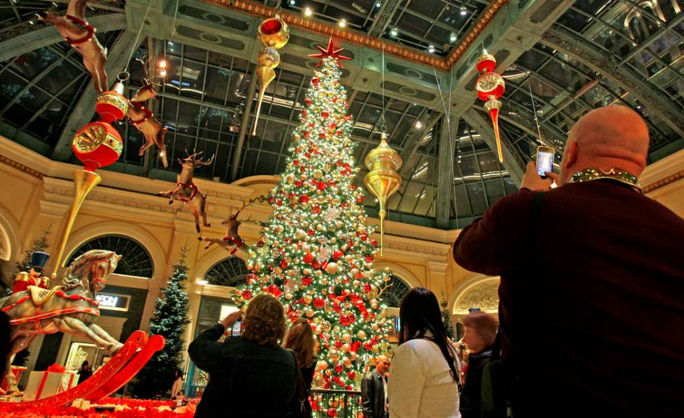 Visitors enjoy the Bellagio Conservatory & Botanical Garden Dec. 3, 2010. John Gurzinski/La ...