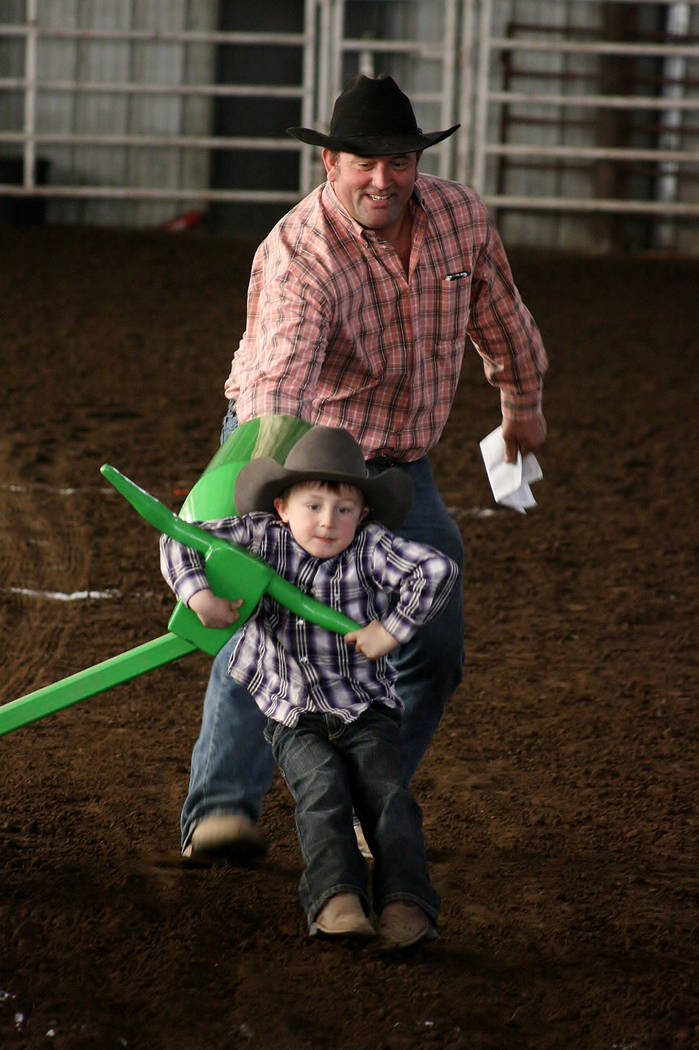 Max Henderson with his father learning how to steer wrestle on March 10, 2918. Max died practic ...