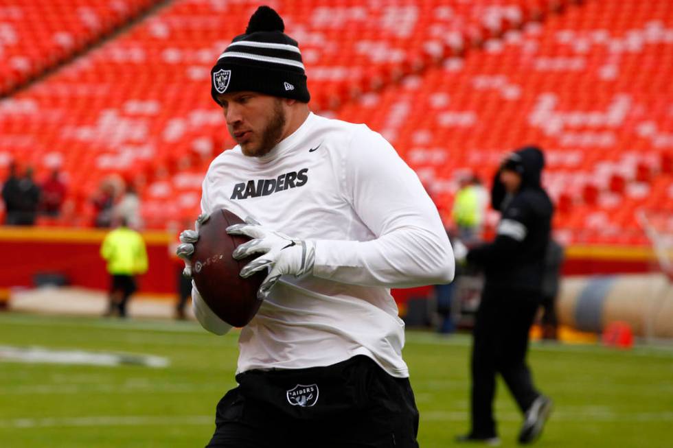 Oakland Raiders tight end Foster Moreau catches the football during pregame warmups before an N ...