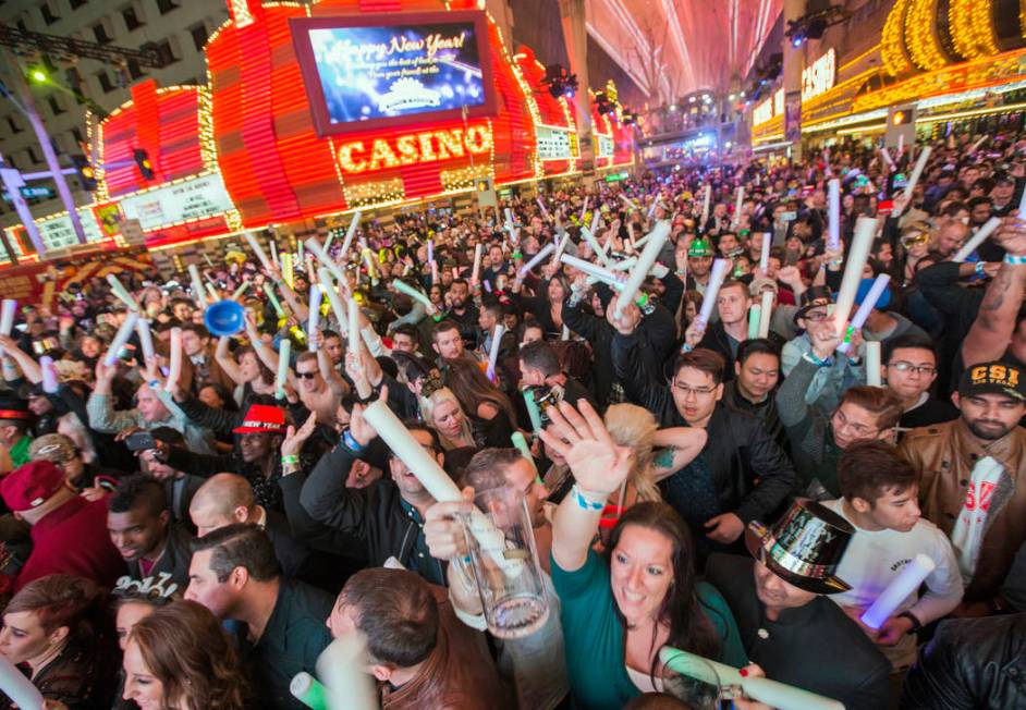 Revelers count down he new year during America's Party on Fremont Street on Saturday, December ...