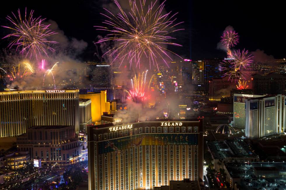 New Year’s fireworks are seen along the Las Vegas Strip from the top of the Trump Internation ...