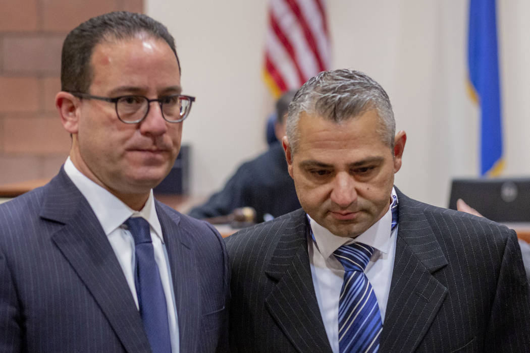 Defense attorney Richard Schonfeld, left, walks with Michel Rantissi Jr., 46, a physical therap ...