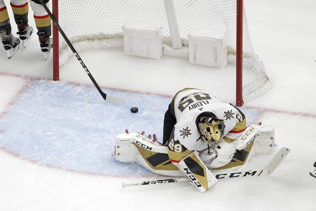 Vegas Golden Knights goaltender Marc-Andre Fleury reacts after giving up a goal to St. Louis Bl ...