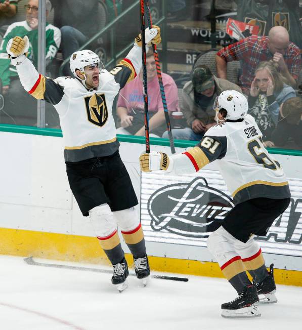 Vegas Golden Knights forward Max Pacioretty (67) is congratulated by forward Mark Stone (61) af ...