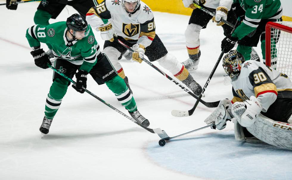 Dallas Stars forward Jason Dickinson (18) attempts a shot as Vegas Golden Knights goaltender Ma ...