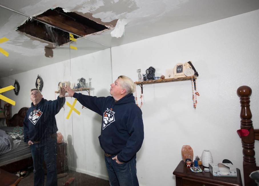 John Bodimer shows the Review-Journal where a leak in the roof of his Las Vegas rental home is ...