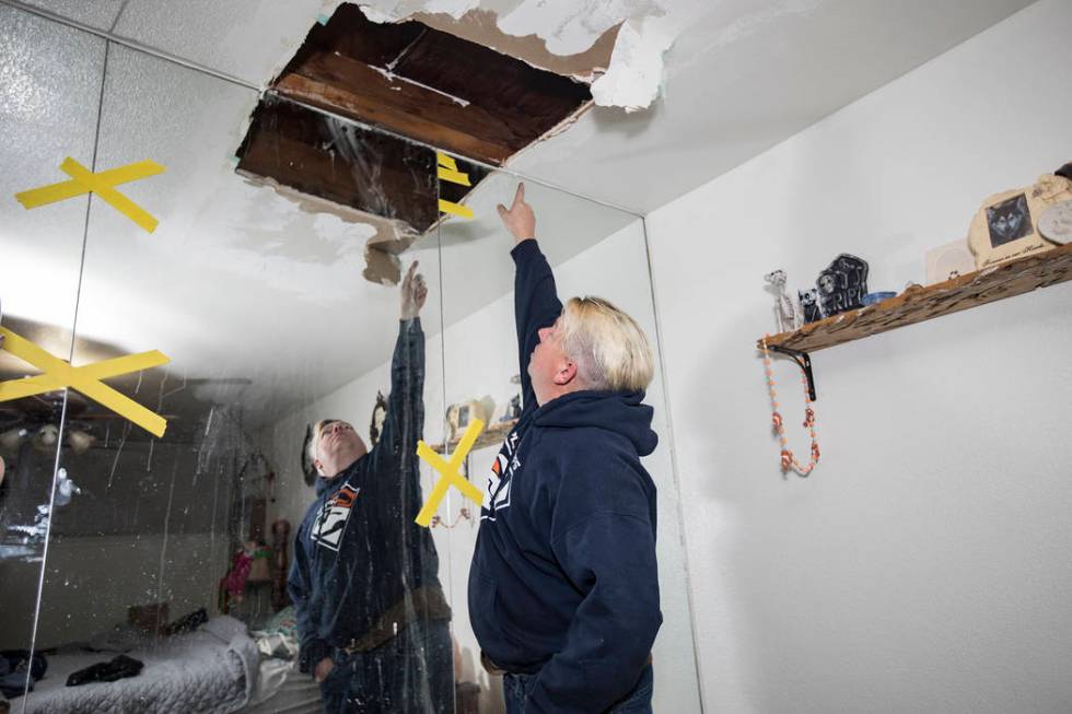 John Bodimer shows the Review-Journal where a leak in the roof of his Las Vegas rental home is ...