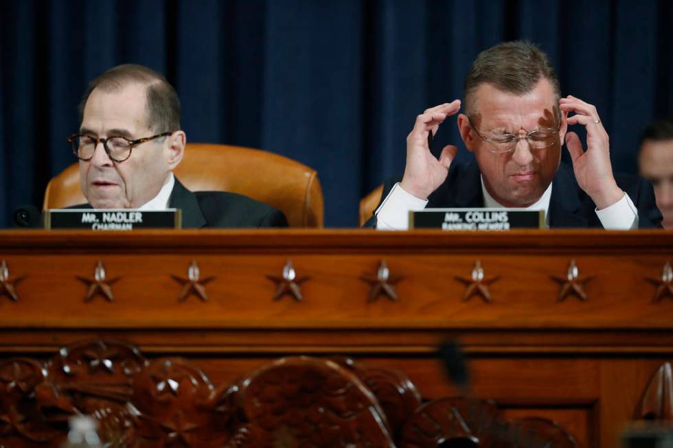 House Judiciary Committee ranking member Rep. Doug Collins, R-Ga., speaks next to House Judicia ...