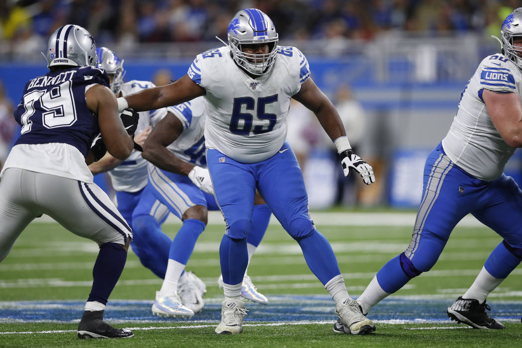 Detroit Lions offensive tackle Tyrell Crosby (65) sets to block against the Dallas Cowboys duri ...