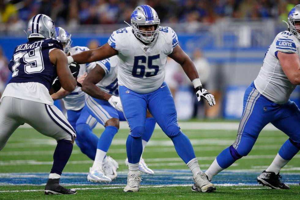 Detroit Lions offensive tackle Tyrell Crosby (65) sets to block against the Dallas Cowboys duri ...