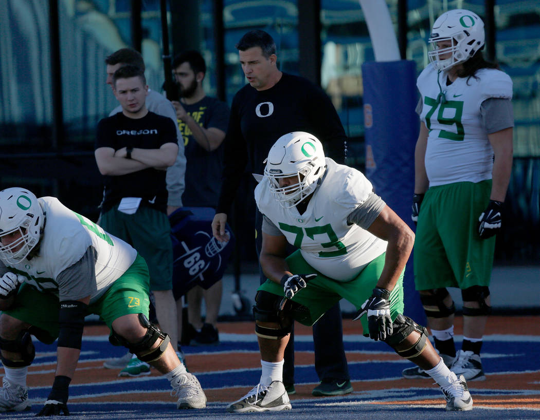 Oregon Ducks offensive lineman Tyrell Crosby (73) during a football practice at Bishop Gorman H ...