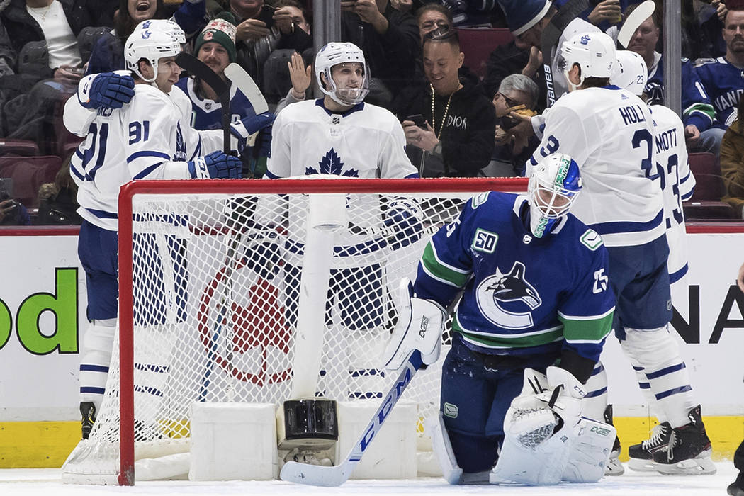 Toronto Maple Leafs' John Tavares, front left, Auston Matthews, back left, Alexander Kerfoot, J ...