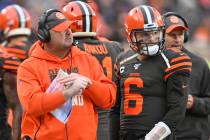 Cleveland Browns head coach Freddie Kitchens stands beside quarterback Baker Mayfield (6) durin ...