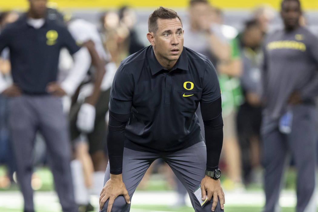 Oregon Ducks Assistant Head Coach Marcus Arroyo looks on during the AdvoCare Classic college fo ...