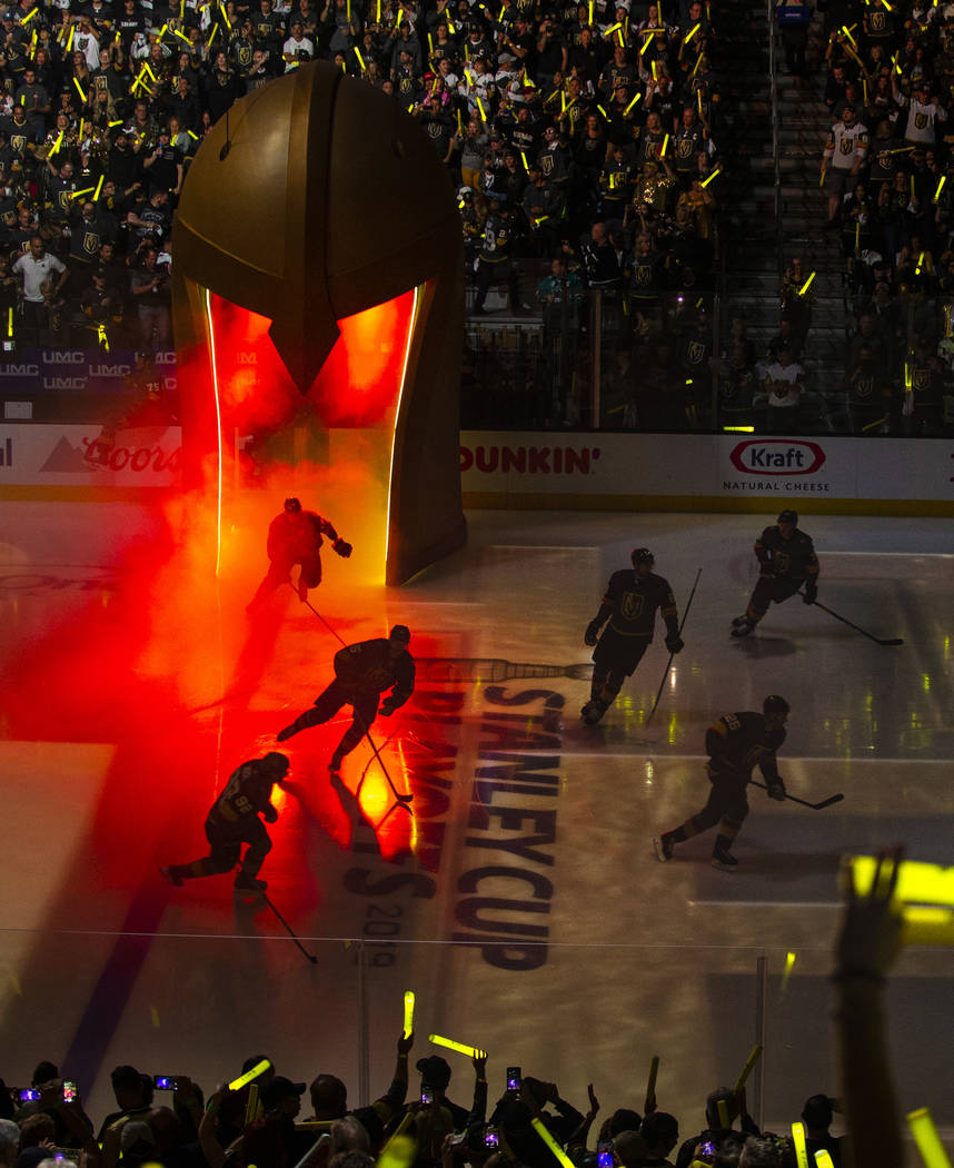 Golden Knights players take the ice during introductions before the first period of Game 3 of a ...